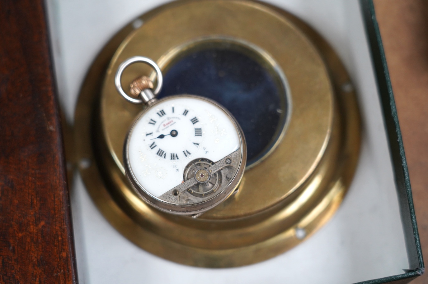 A George V silver Hebdomas eight day patent pocket watch, a late Victorian silver open face pocket watch and two watch cases. Condition - poor to fair